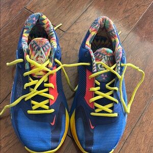 Blue and Yellow Sneakers with Vibrant Laces
